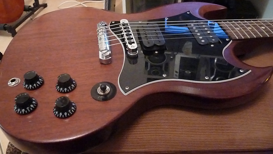 Photo : Gibson     SG    custom Micros Dimarzio