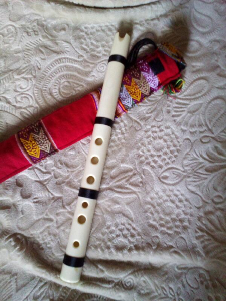 Photo : Flute          Quena en os veritable du Perou